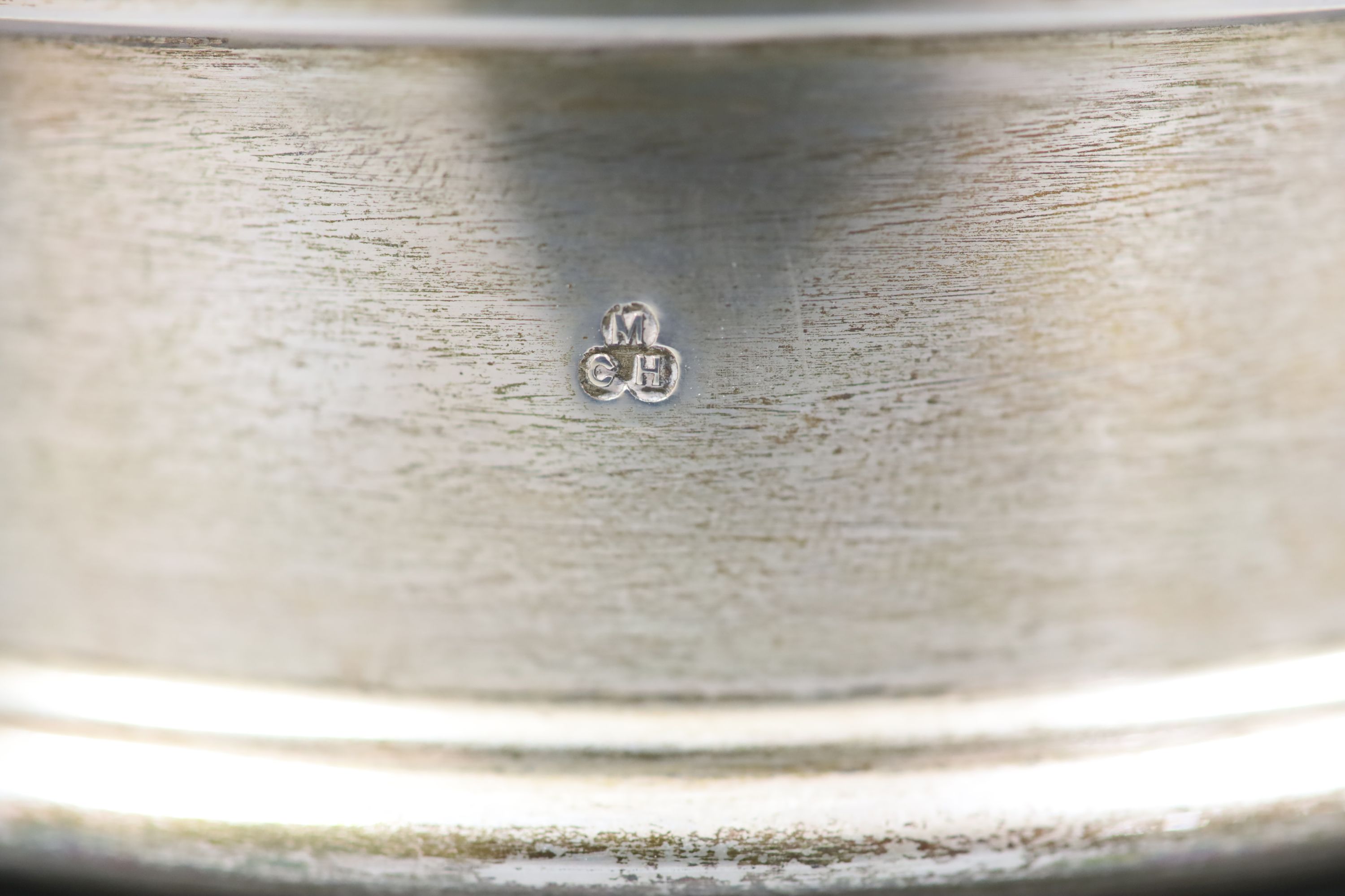 A pair of modern silver bottle coasters